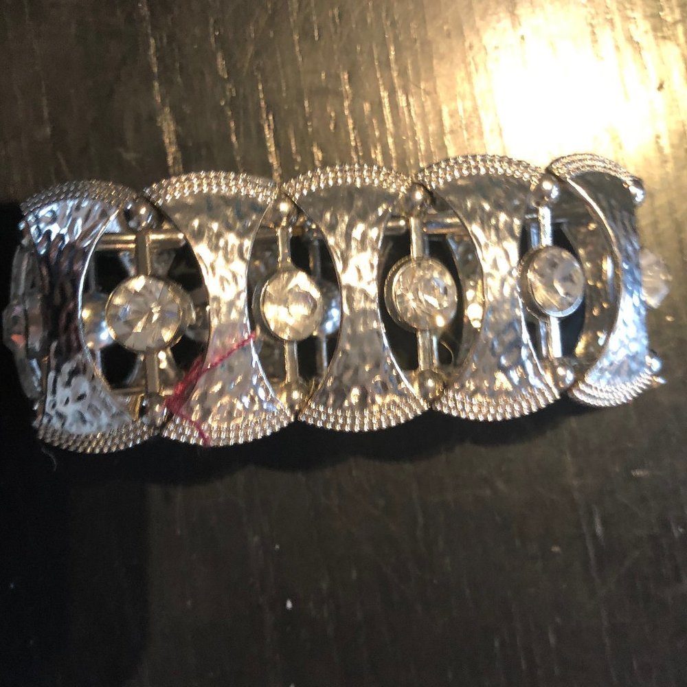 Rhinestone and silver statement bangle